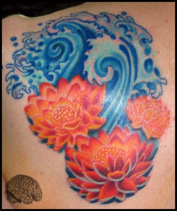 Phil Robertson - Lotus and water tattoo